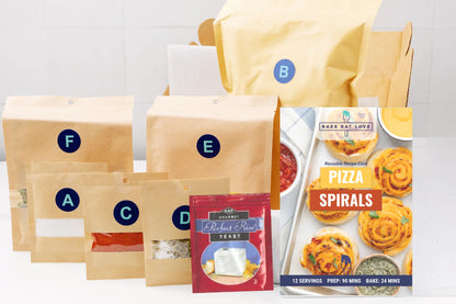 Pizza Spiral Baking Kit includes premeasured ingredients, a recipe card, and online videos